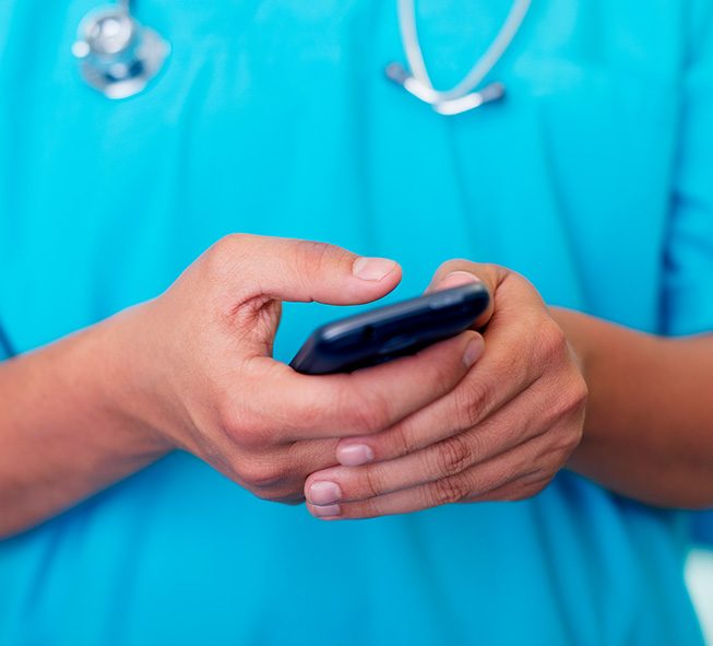 nurse holding phone